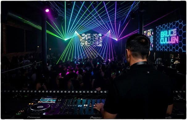Bruce Cullen, Las Vegas DJ for hire, performing live at a nightclub with Pioneer CDJ mixers